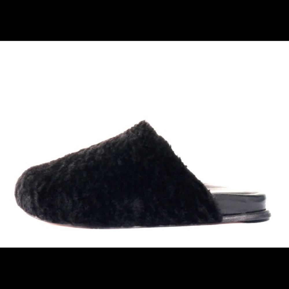 Shearling-lined mules black refined and timeless